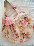 Vintage rose hobo shoulder bag with a large decorative fabric flower, ruffles and lace details