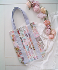 Floral patchwork tote bag with a decorative crochet lace insert in romantic shabby chic style