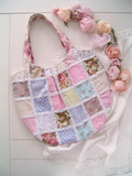 Quilted floral patchwork tote bag with decorative lace trim in shabby chic style