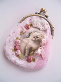 Vintage cat portrait kiss lock purse with pink polka dot fabric and a metal frame