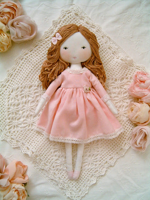 Pink handmade rag doll by Sweet Dream Rose with a romantic vintage-inspired fabric outfit