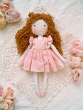 Handmade rag doll wearing a pink dress in romantic shabby chic style by Sweet Dream Rose
