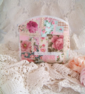 Floral patchwork makeup bag with quilted fabric and vintage-inspired lace details